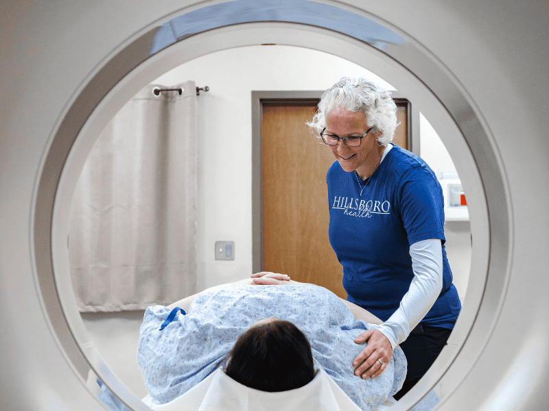 MRI Machine with Patient and Employee