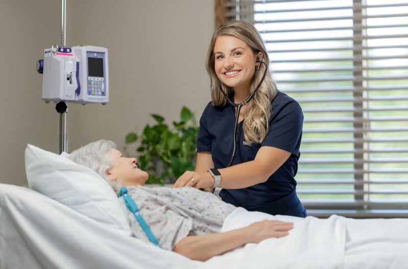Nurse Morgan Smiling with Patient